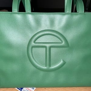 Only used once great emerald color medium sized bag